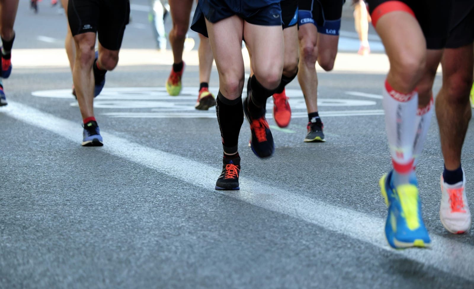 Runners moving together during a road race