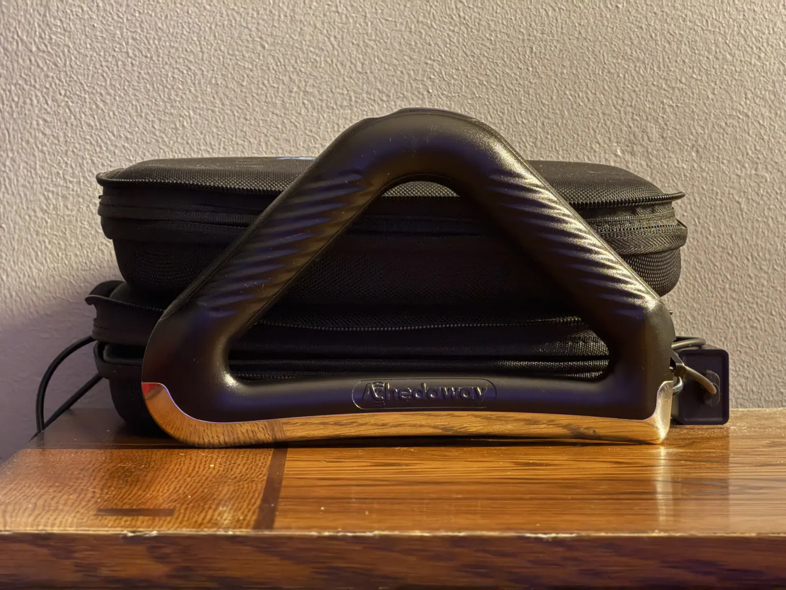 Powered bodywork tool stored with its cases in the MMI treatment room